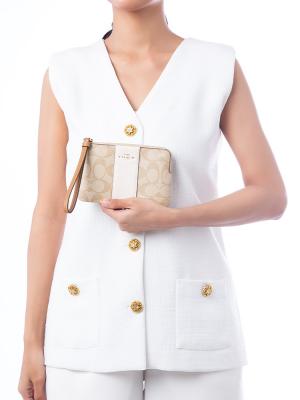 CR945 Signature Stripe Wristlet Light Khaki Chalk Light Saddle