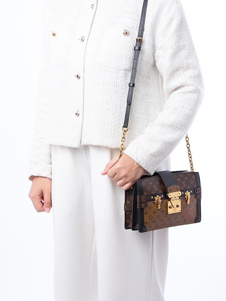 Reverse Monogram Trunk Clutch