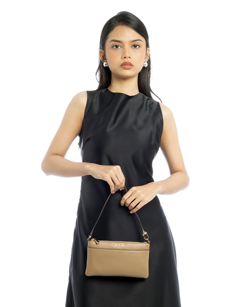 Jet Set Pebbled Leather Medium Wristlet Husk